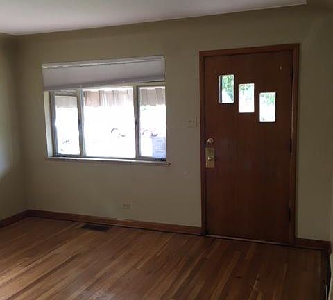 Living room, west window, front door