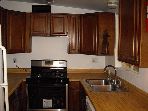 Kitchen lots of cabinets lots of counter top space.