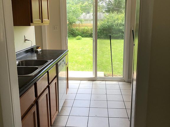 Look at all of that light! Ceiling fan in kitchen