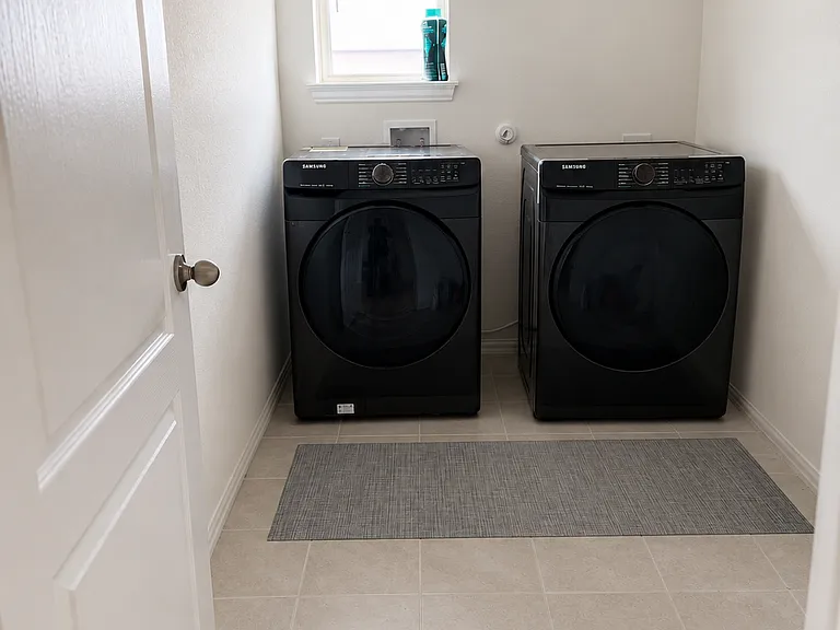 Laundry room with washer and dryer