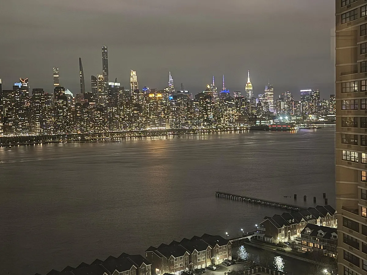 Night view of the beautiful NY city skyline including Empire State Building - Boulevard East