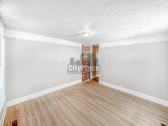1319 W 27th St — Photo 5
