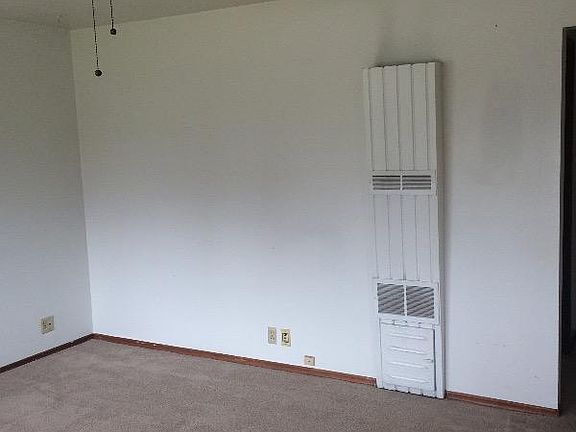 Gas wall furnace in living room