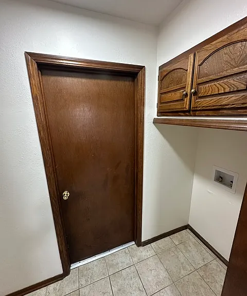 Laundry room (furnished with washer and dryer, if needed)