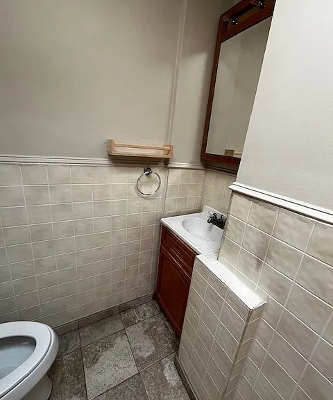 1st bathroom as you enter apartment