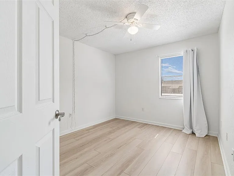 10100 Sailwinds Blvd N #202 — Photo 25