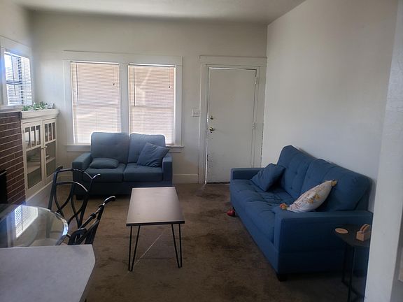 Living room with decorative fireplace