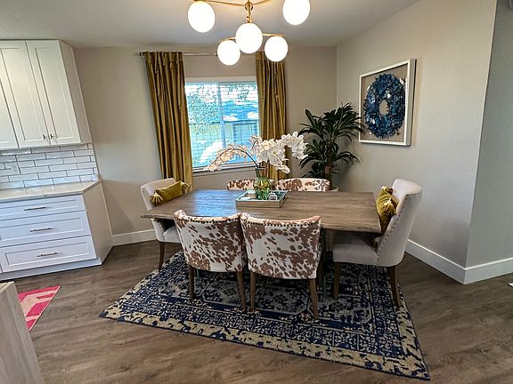 Dining room has seating for 6 + two extra chairs in the guest bedrooms if you want to squeeze in 8.