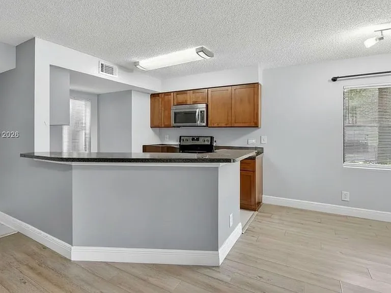 9999 Summerbreeze Dr #401 — Photo 5