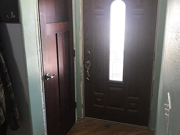 Main door and coat closet
