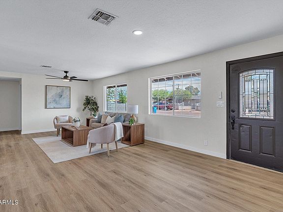 5th image of 10418 E ALBANY Street