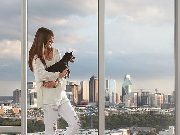 Stunning Penthouse views with floor-to-ceiling windows and roller blinds