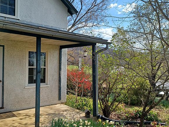 Cottage porch and early spring flowers