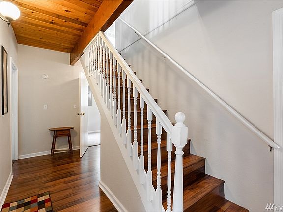 Check out those tongue & groove ceilings and exposed beams!