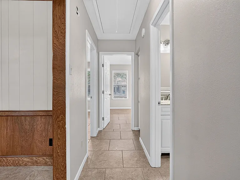 Hallway of three bedrooms and Bath