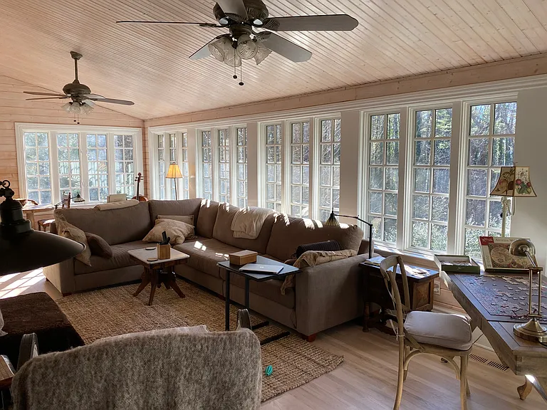 Sunroom with large TV