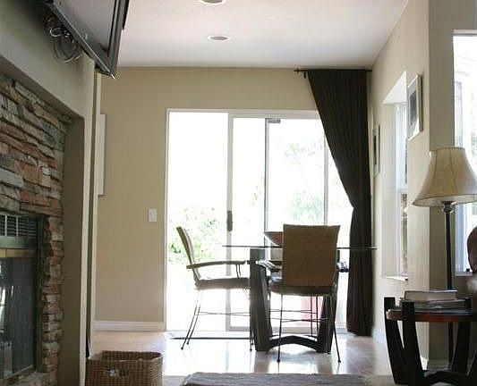 Flat Screen TV fireplace to Dining Room