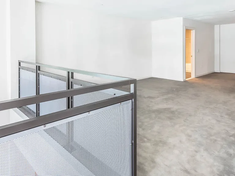 Carpeted Bedroom Loft Space