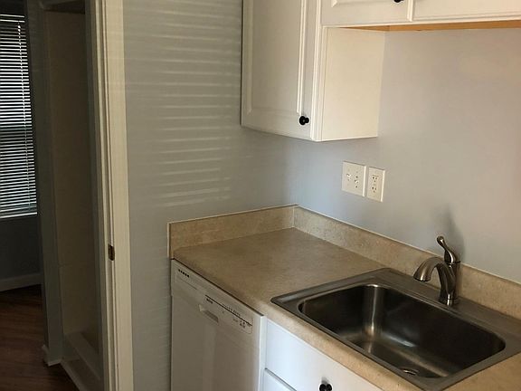 Kitchen. Full bath through doorway.