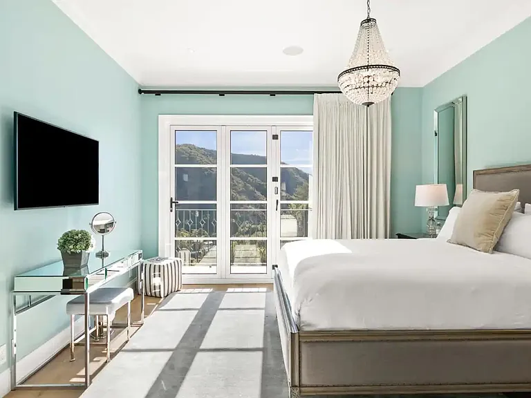 Enjoy this stunning bedroom and comfy King size bed while enjoying a movie or book.