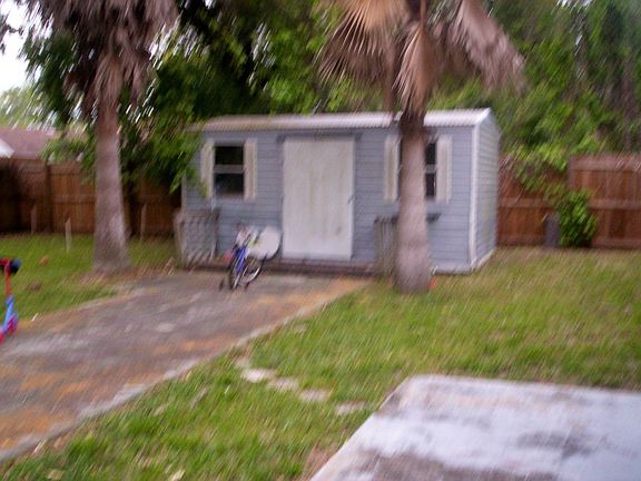 Shed in fenced yard