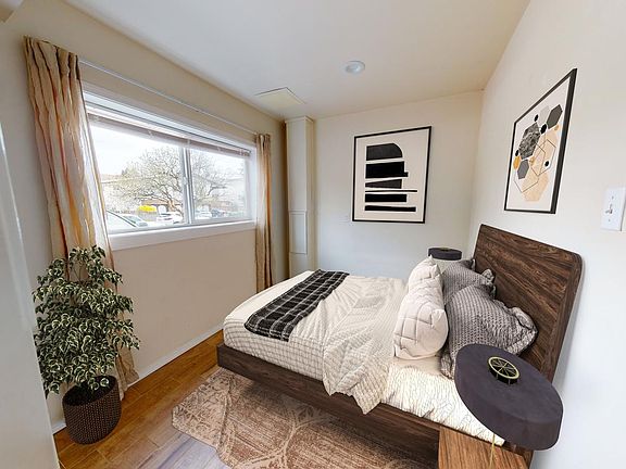 Bed 1- This image shows a virtually furnished space. Bedrooms come unfurnished.