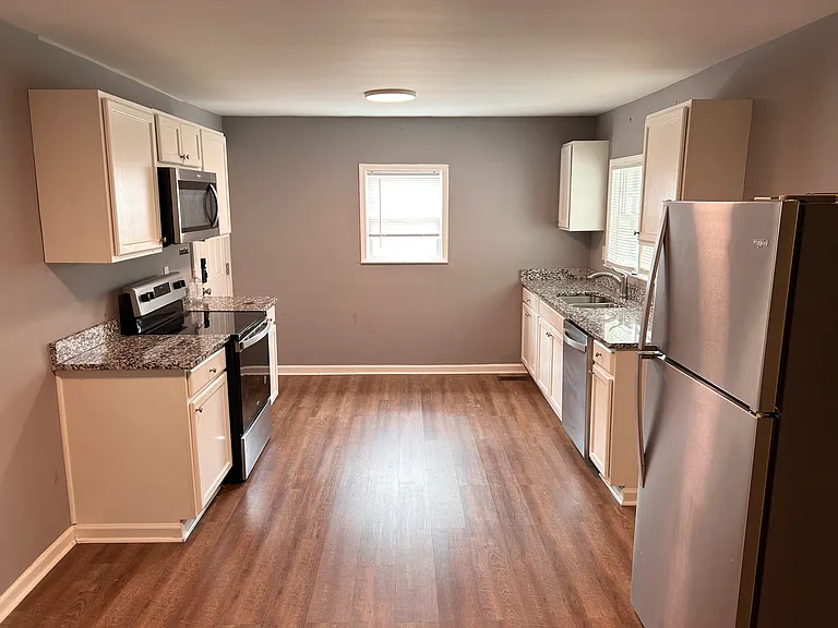Updated Kitchen with all Stainless Steel Appliances and Granite Counter, refreshed Cabinets