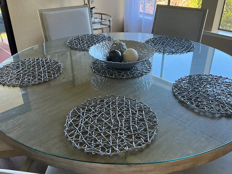 Formal Contemporary Dinning room with ocean view and chandelier. comfortable seating for 6.