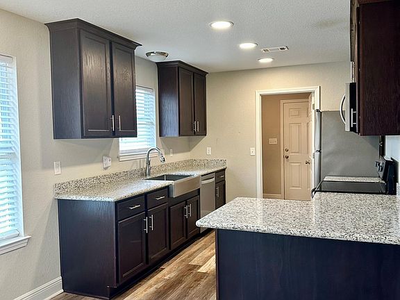 Kitchen with granite countertops