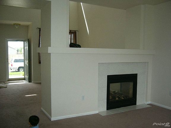 family_room_with_2_sided_fireplace