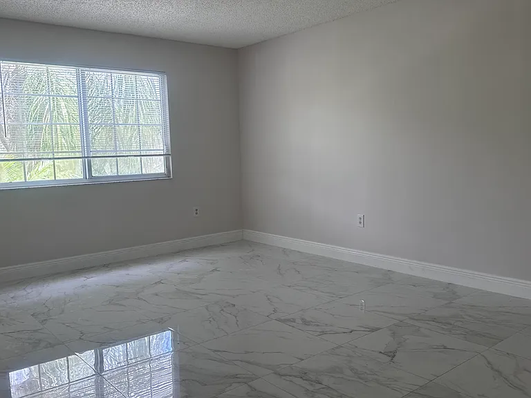 5011 Wiles Rd #207 — Photo 32