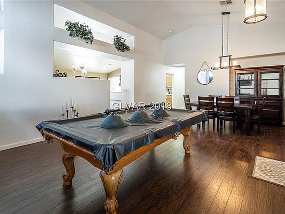 Living room showing entry to family room