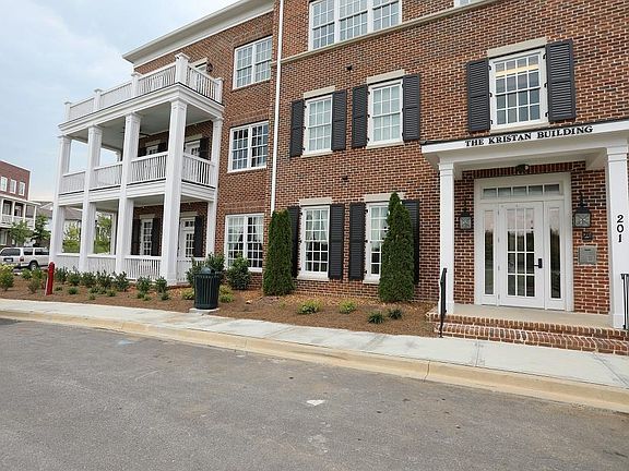 This area in front of the building now has half a dozen public parking spaces.