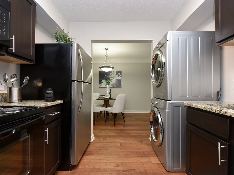 Kitchen with in-home washer & dryer
