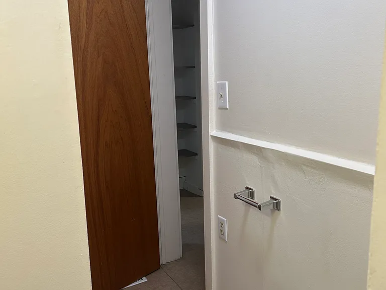 Bathroom looking out into hallway
