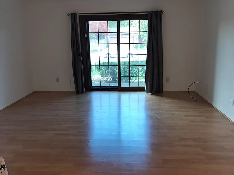 Livingroom with newer double lock Pella sliding door to patio.