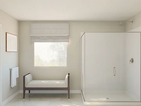 Primary bath with glass shower enclosure