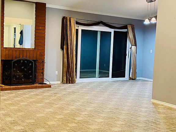 Airy living room with vaulted ceiling.