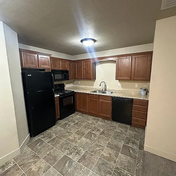 This photo is from a congruent kitchen. The appliances in this unit are stainless steel.