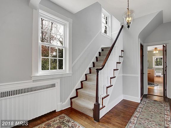 Walk into this beautiful side staircase foyer