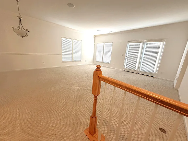 -2nd floor Large Living and Dining room. 
-The carpet on stairs will be replaced by LVP plank flooring.