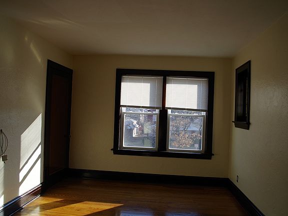 Beautiful Living room with two stained glass windows and rea
