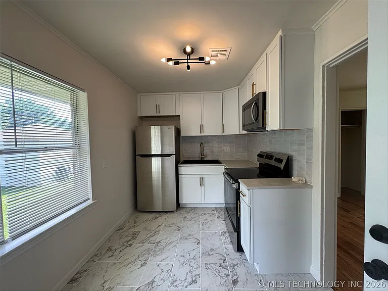 2743 E 3rd St — Photo 8