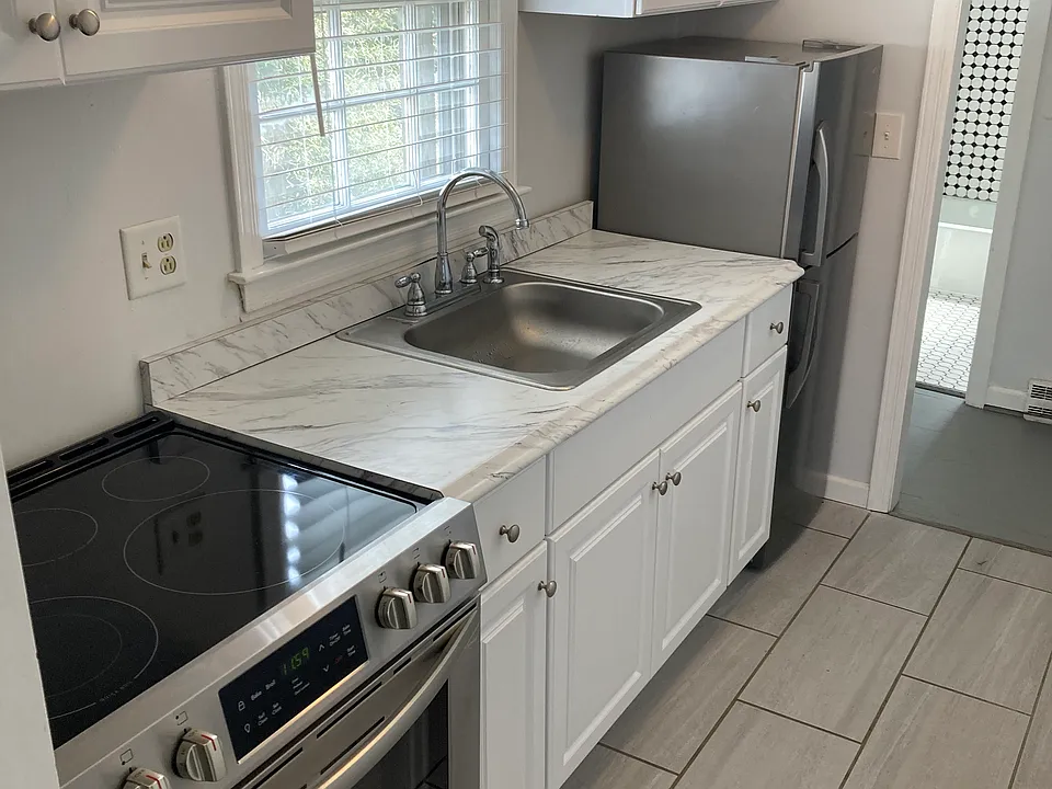 Another view of kitchen with two ways to enter