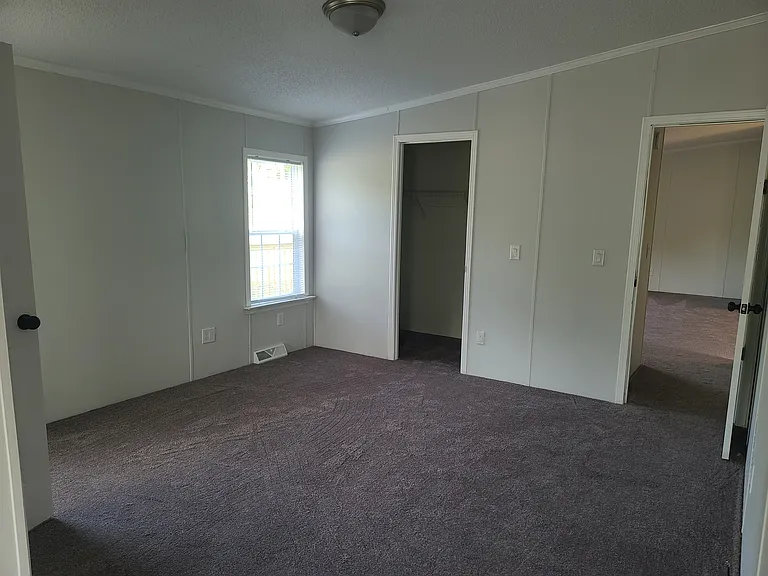 Master bedroom with large walk-in closet