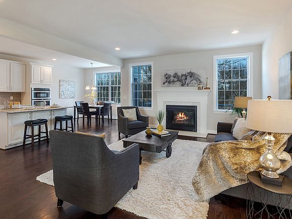Kitchen island overlooks great room and casual dining area