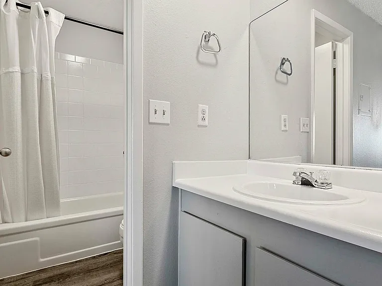 Experience modern convenience and style in this thoughtfully designed bathroom.