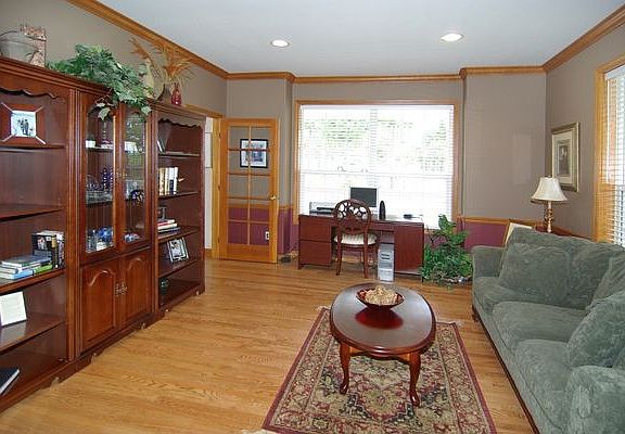 Front room w/ french doors can be used as a sitting room or office/study