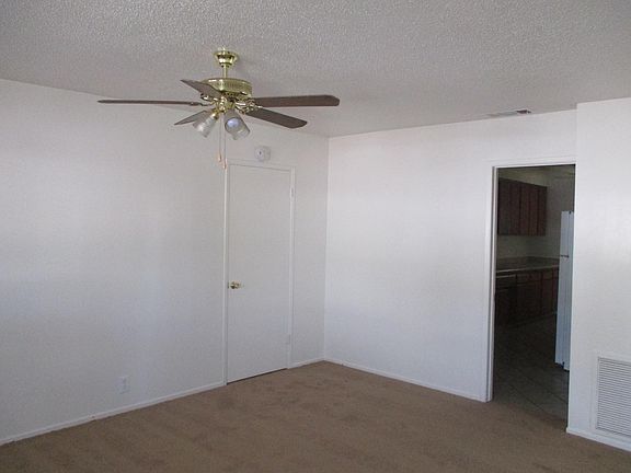 Large living room with ceiling fan