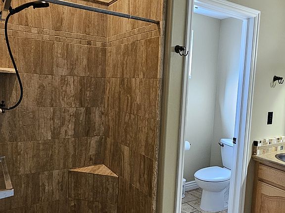 Upstairs Master Bathroom with a Walk in Shower